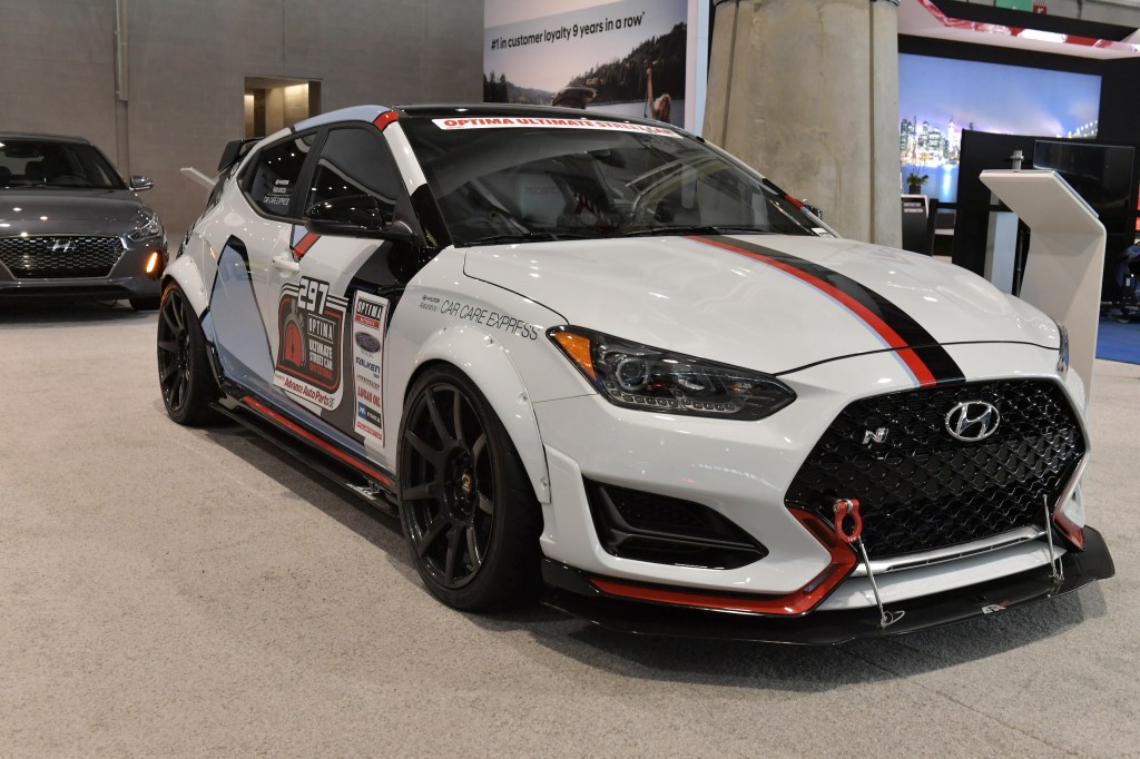 The white Hyundai Veloster N is seen at the 2019 New England International Auto Show Press Preview at Boston Convention & Exhibition Center