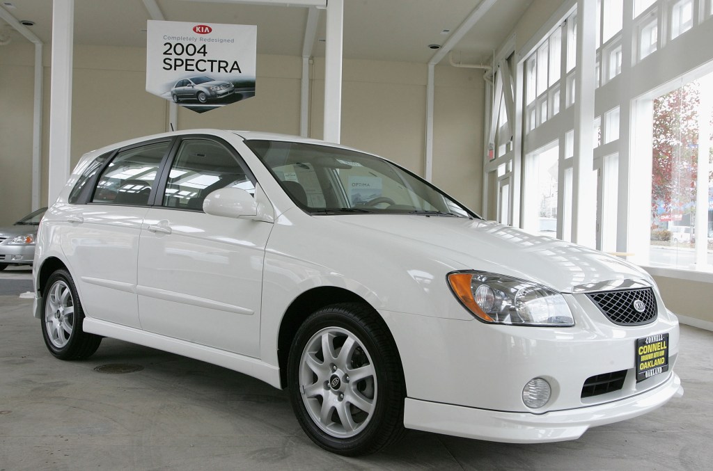 A white Kia Spectra on display at a showroom in Oakland, California makes our list of ugly cars.