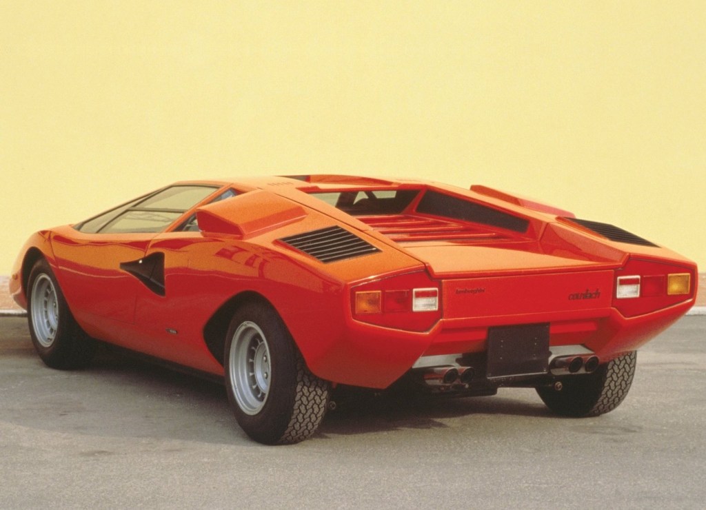 An image of a red Lamborghini Countach LP400 parked outdoors.
