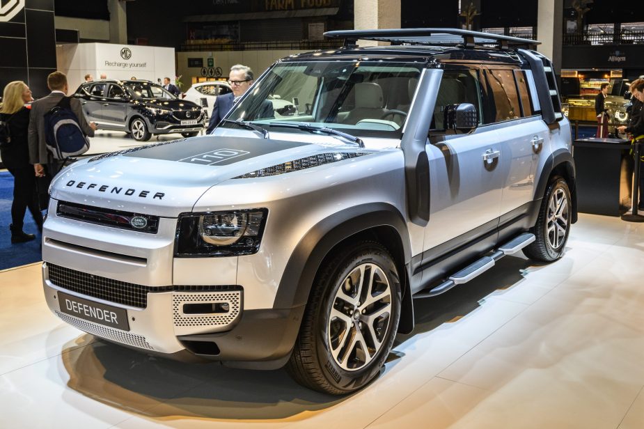 Silver Land Rover Defender 110 off-road 4x4 vehicle on display at Brussels Expo