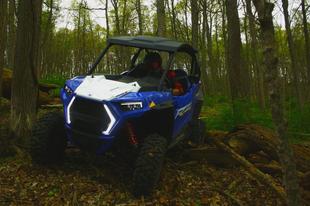 2021 Polaris RZR Trail S Sport ripping through a wooded trail