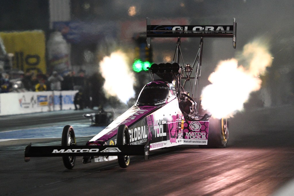 A dragster shoots flames. The Matco Tools dragster won in the first eliminating round of the 2021 SpringNationals. 