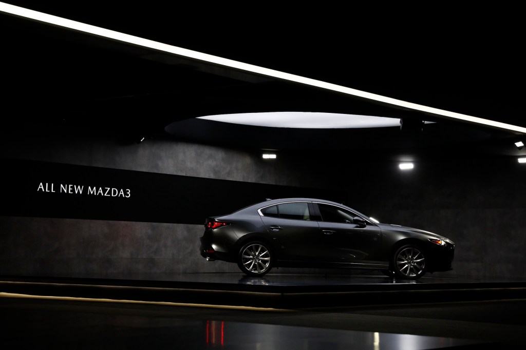 A gray Mazda Motor Corp. Mazda3 sedan is displayed during AutoMobility LA ahead of the Los Angeles Auto Show