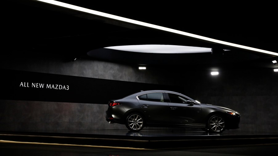 A gray Mazda Motor Corp. Mazda3 sedan is displayed during AutoMobility LA ahead of the Los Angeles Auto Show