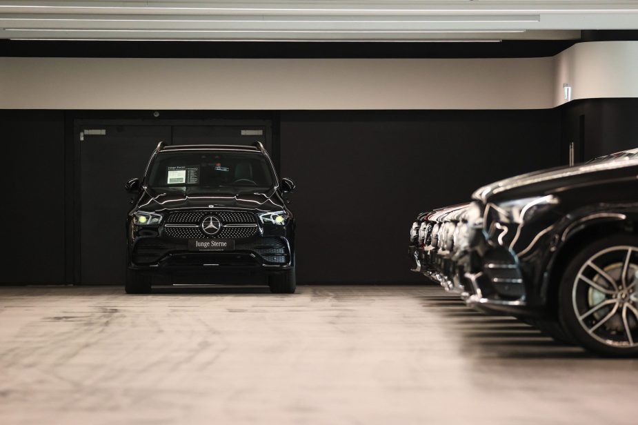 A new Mercedes-Benz GLE SUV and other automobiles in a storage garage at a Daimler AG showroom in Frankfurt, Germany