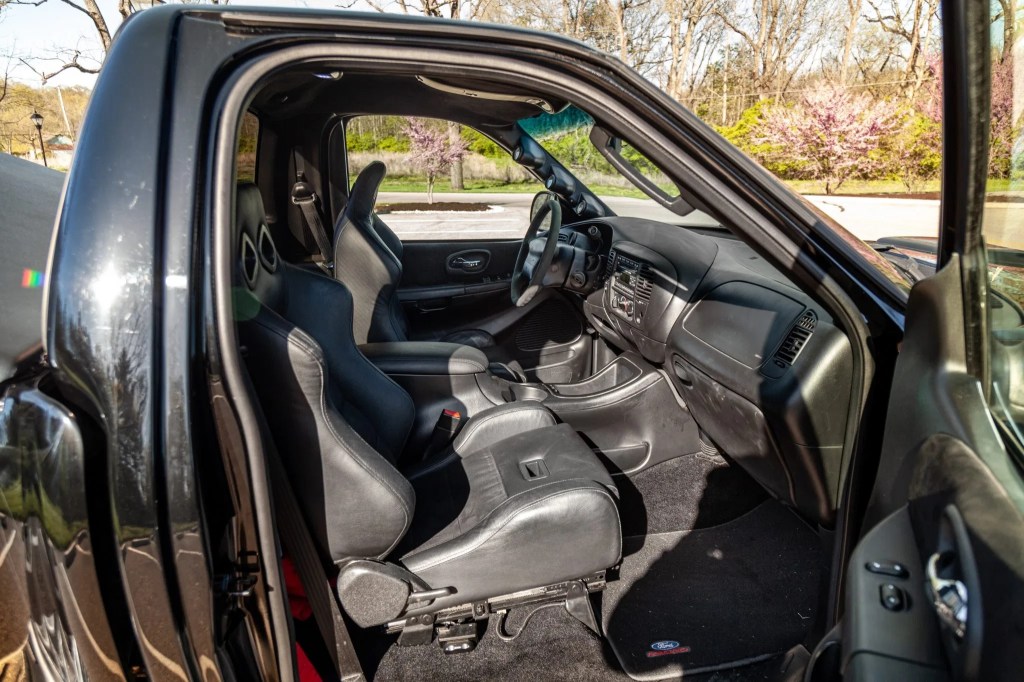 The black interior of a modified 2002 Ford F-150 SVT Lightning