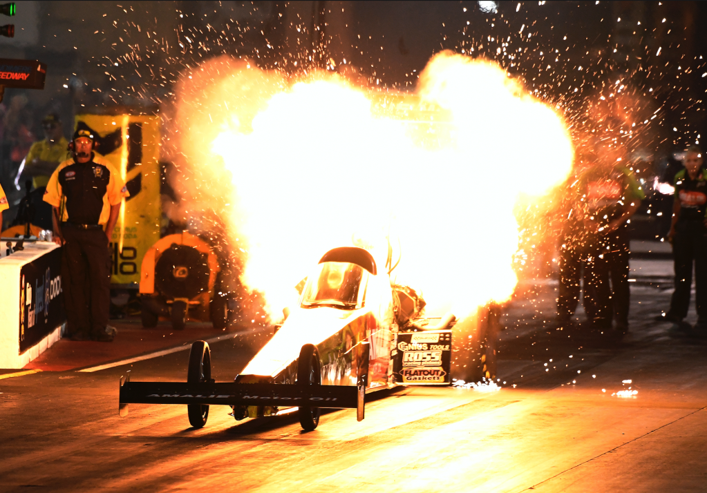 fire, flames and nitro of NHRA Top Fuel drag racing