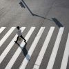 lone pedestrian in crosswalk