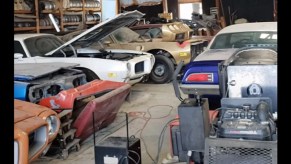 a garage full of vintage Pontiac Firebird barn finds