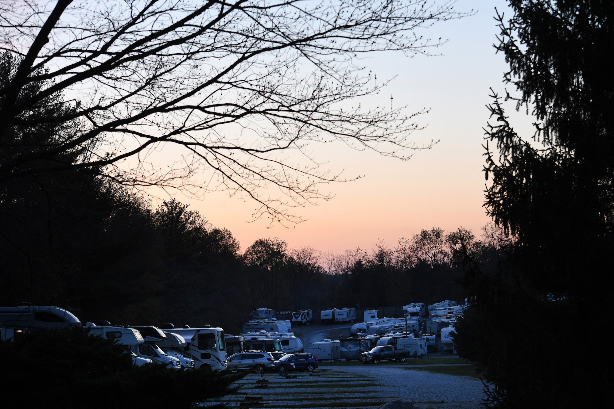 Trailers, motorhomes, and camper vans parked at the Ramblin Pines Campsite outside of Baltimore in Woodbine, Maryland on April 23, 2021