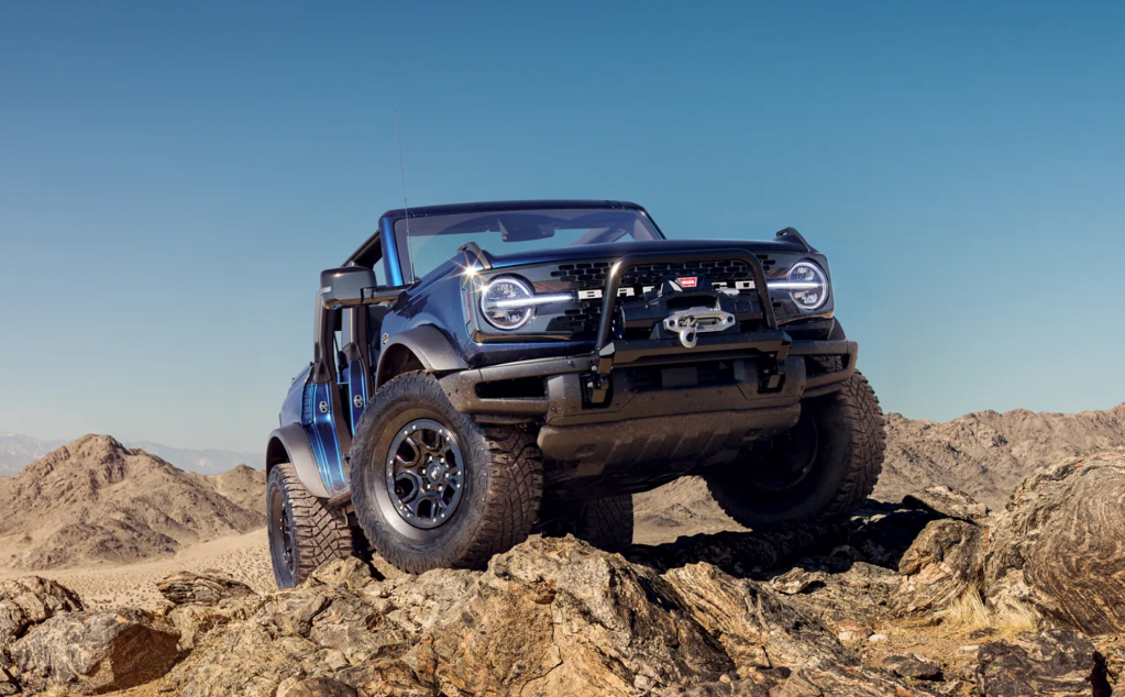 The 2021 Ford Bronco crawling over rocks. 