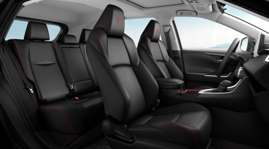 The interior of a Toyota RAV4 with "TRD" stitched into the headrests.