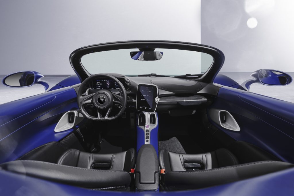 An image of a 2021 McLaren Elva parked inside of a photo studio.