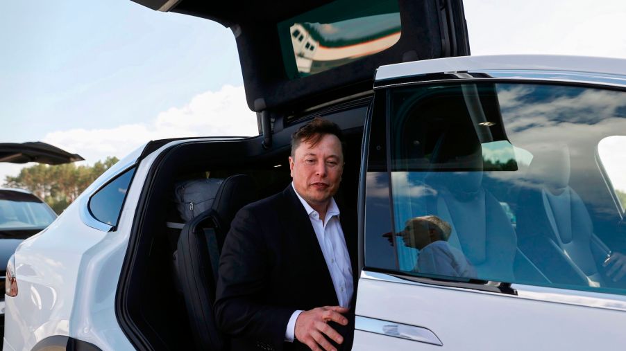 Tesla CEO Elon Musk gets into a white Tesla Model X SUV after talking to media on September 3, 2020, in Gruenheide, Germany