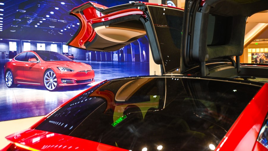 A red Tesla Model X electric SUV parked in a showroom in Shanghai, China, on January 4, 2021