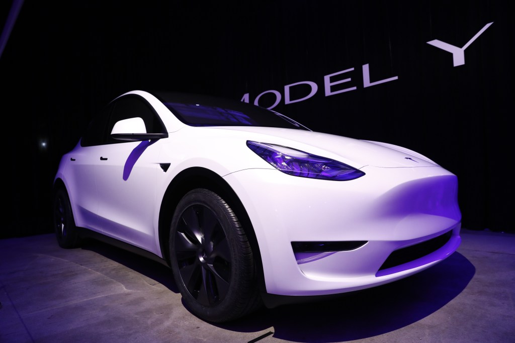 The Tesla Inc. Model Y crossover electric vehicle sits on display during an unveiling event.