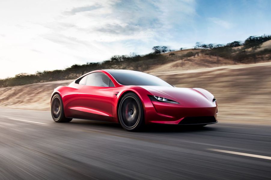 Tesla Roadster at speed on highway