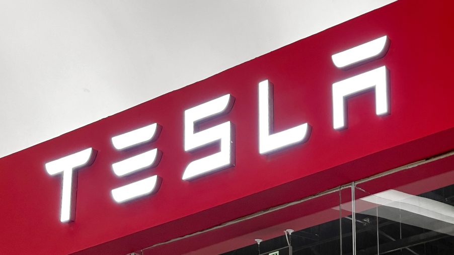 A red Tesla sign.