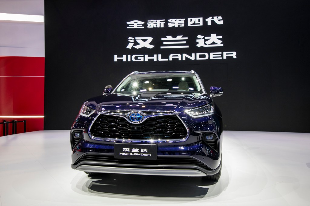 A blue Toyota Highlander car is on display during the 19th Shanghai International Automobile Industry Exhibition