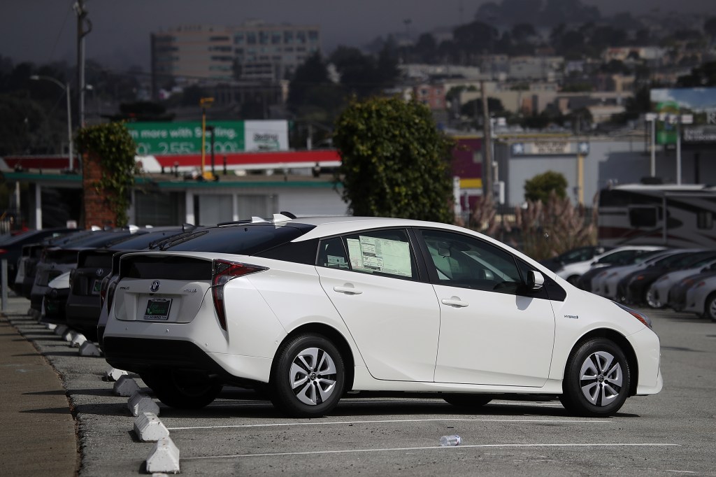 Brand new Toyota Prius cars are displayed on a sales lot at City Toyota on September 5, 2018