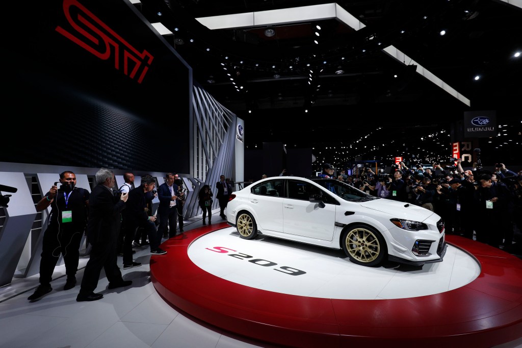 The white Subaru WRX STI S209 is revealed at the 2019 North American International Auto Show during Media preview days