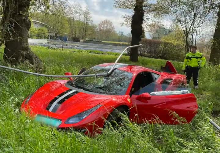 wrecked red Ferrari 488 Pista after crash