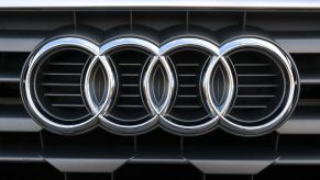The logo of the German carmaker Audi is seen on a car at their headquarters in Ingolstadt