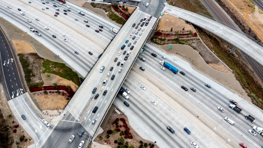 An aerial view of traffic on the 91 Freeway and the Green River Road overpass on May 20, 2021, in Corona, California