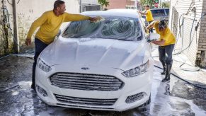 Men washing a car