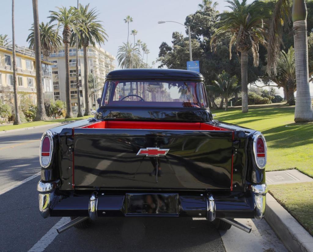 back of a black 1956 chevy 3100 pickup truck