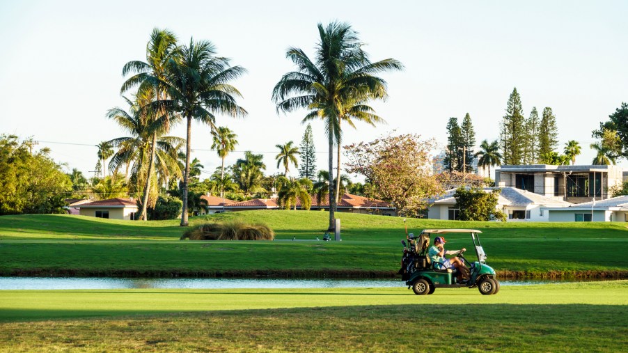A golf cart on Normandy Shores Golf Club Course in Miami Beach, Florida