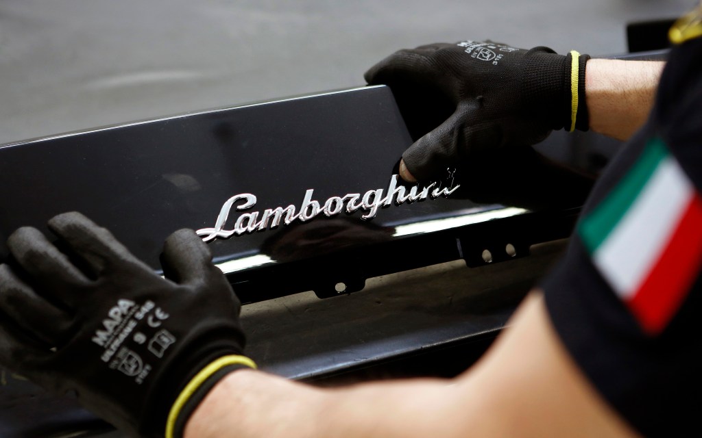 A Lamborghini badge in cursive