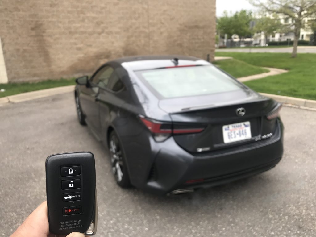 Holding the key fob up to remotely start the Lexus RC 350 |
