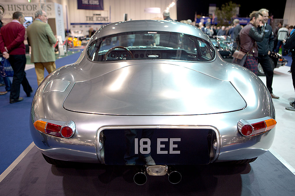 The rear of the Eagle Low Drag GT, a restomodded Jaguar E-Type shown under a lightbox.