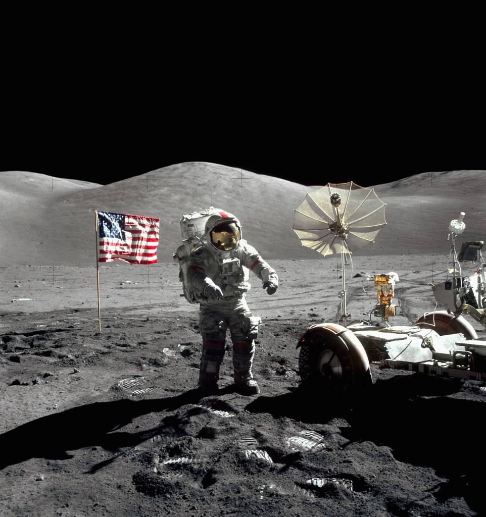 An astronaut next to his moon buggy. GM is sending a lunar rover to the moon in partnership with Lockheed Martin and NASA.