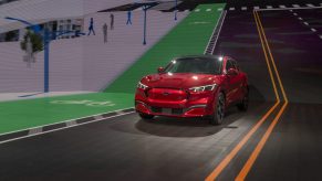 A red mustang mach-e on display