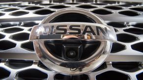 Upclose look at the grill and front camera of the Nissan Titan pickup truck