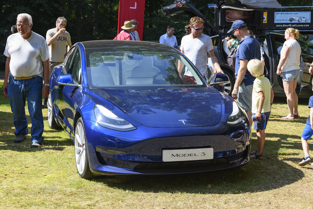 Blue Tesla Model 3 on display