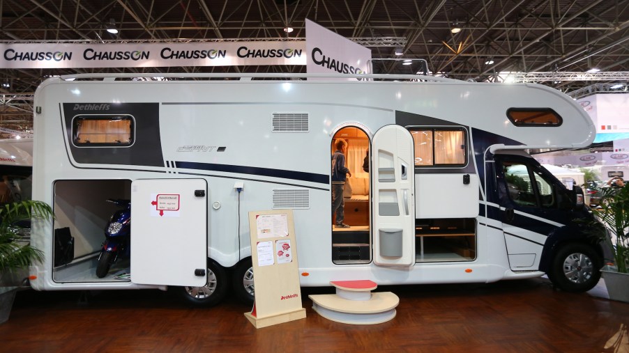 A toy hauler RV motorhome carrying a motorcycle at the Caravan Salon Duesseldorf expo in Duesseldorf, Germany, on September 4, 2014