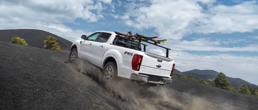 A 2021 Ford Ranger climbs a dirt hill.
