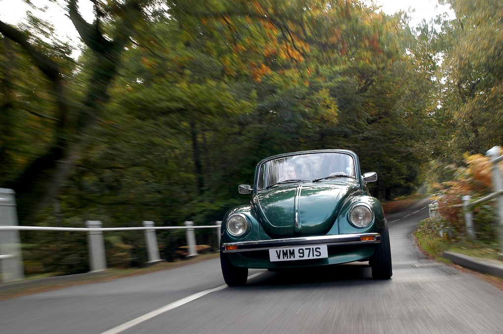 A 1978 Volkswagen Beetle Cabriolet driving; if you're buying a classic car, don't skip the test drive.