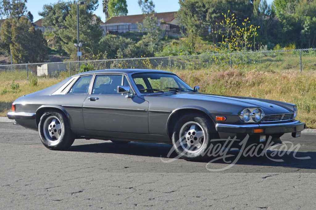 profile shot of blue 1987 Jaguar XJS sold at Barrett-Jackson 
