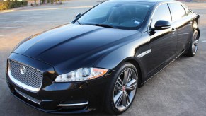 A black 2012 Jaguar XJL Supercharged in a parking lot