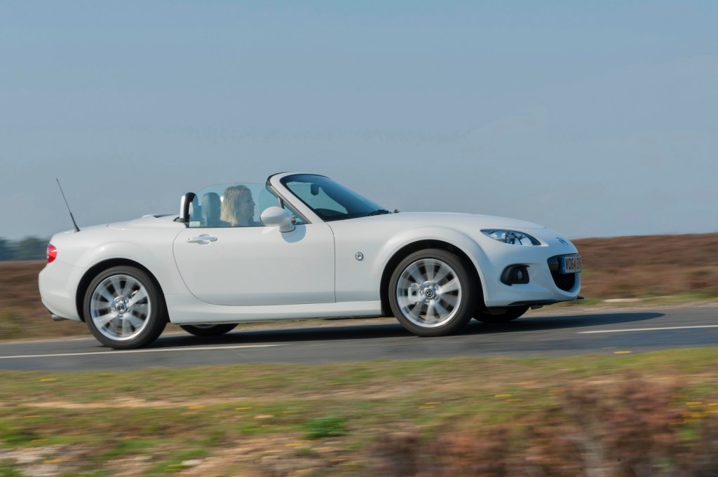 A white 2014 Mazda MX5 Roadster Coupe 