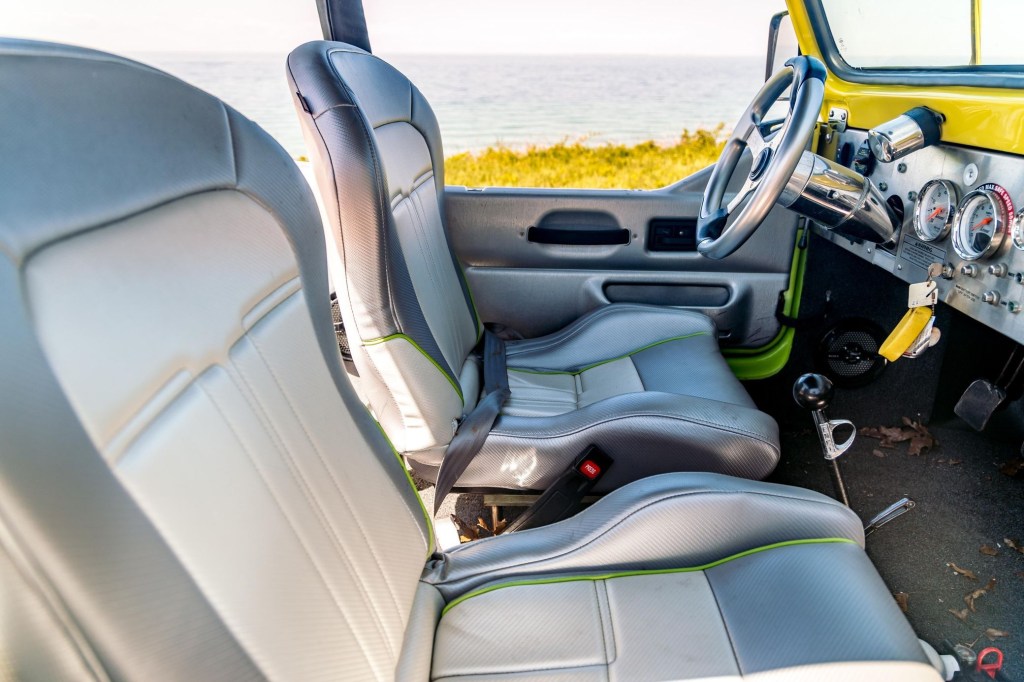 The gray-vinyl seats and gray-and-green dashboard of a 2016 WaterCar Panther