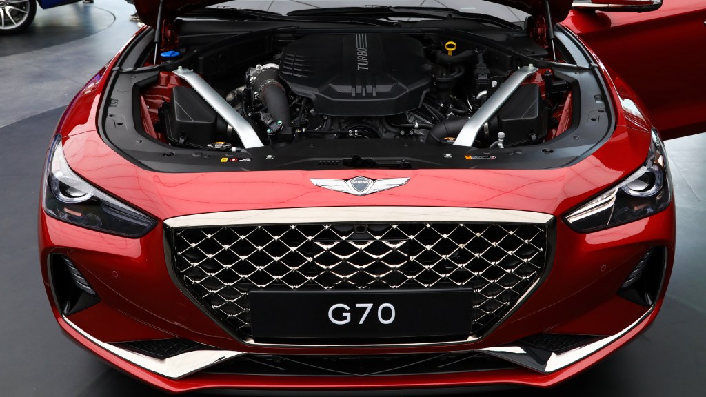 A red Hyundai Motor Co. Genesis G70 sedan is seen during a launch event in Hwaseong, South Korea.