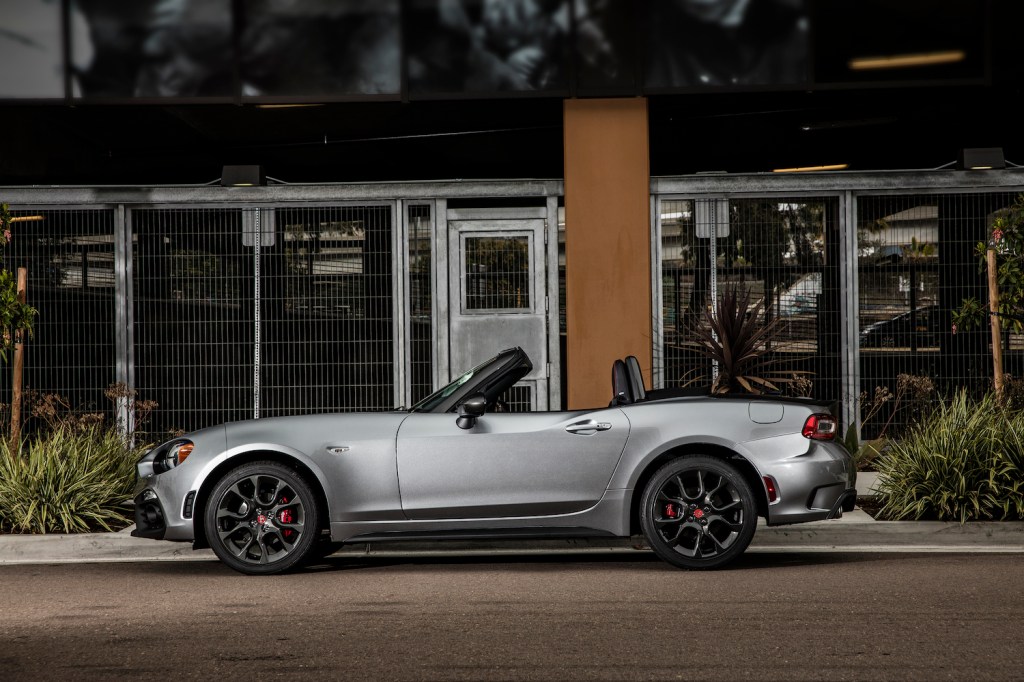 A silver 2018 Fiat 124 Spider parked outside