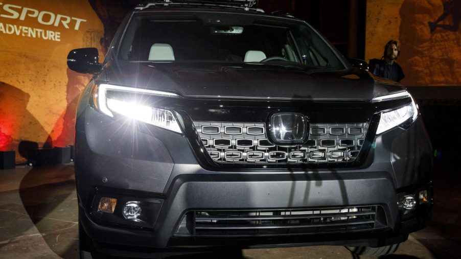 A black Honda Motor Co. Passport sport utility vehicle (SUV) sits on display during a reveal event