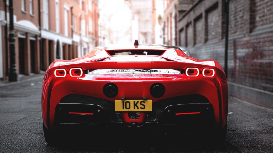 A red Ferrari SF90 Stradale parked in an alley in Mayfair, London, on April 14, 2021