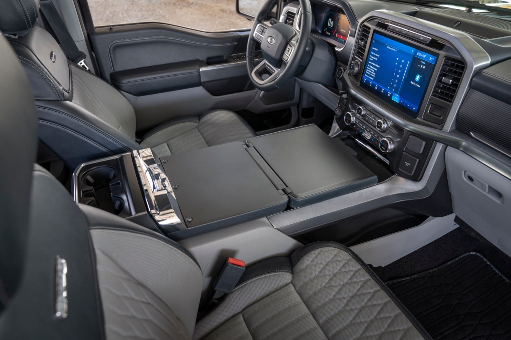 A 2021 Ford F-150 pickup truck interior with dark-gray ventilated seats